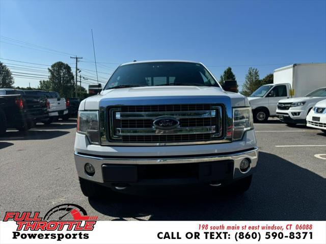 used 2014 Ford F-150 car, priced at $10,999