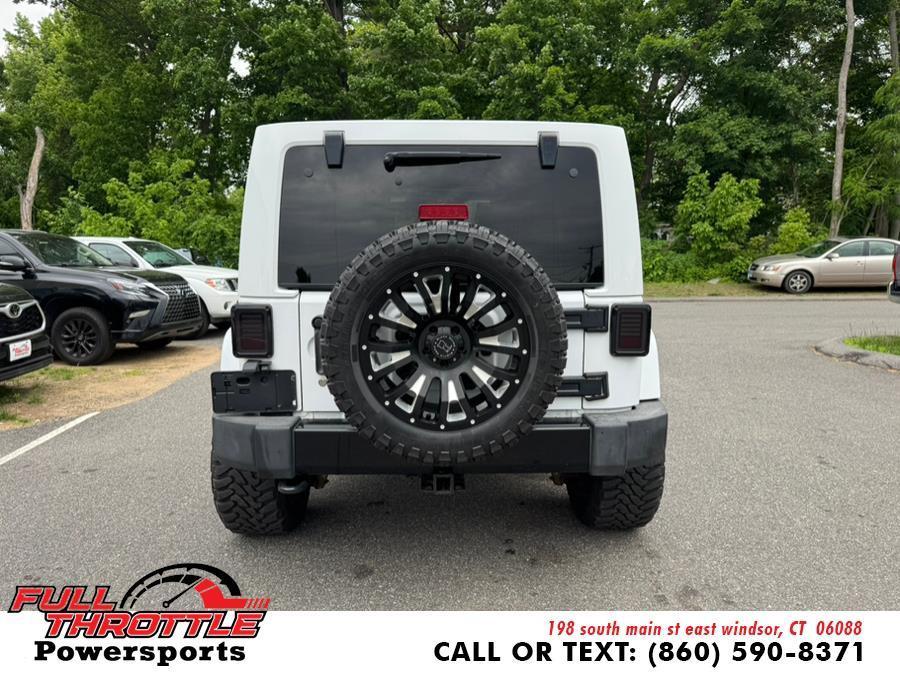 used 2014 Jeep Wrangler Unlimited car, priced at $16,999