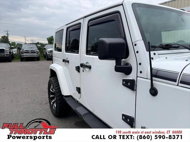 used 2014 Jeep Wrangler Unlimited car, priced at $16,999