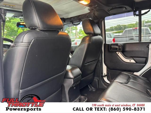 used 2014 Jeep Wrangler Unlimited car, priced at $16,999
