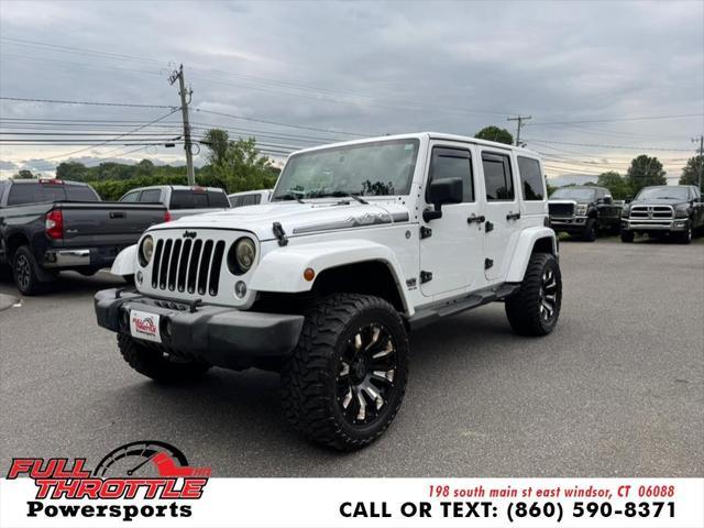 used 2014 Jeep Wrangler Unlimited car, priced at $16,999
