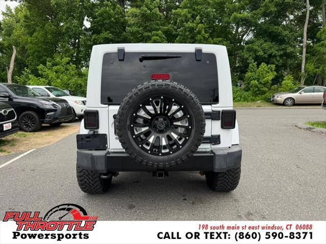 used 2014 Jeep Wrangler Unlimited car, priced at $16,999