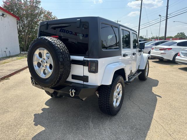 used 2013 Jeep Wrangler Unlimited car, priced at $15,495