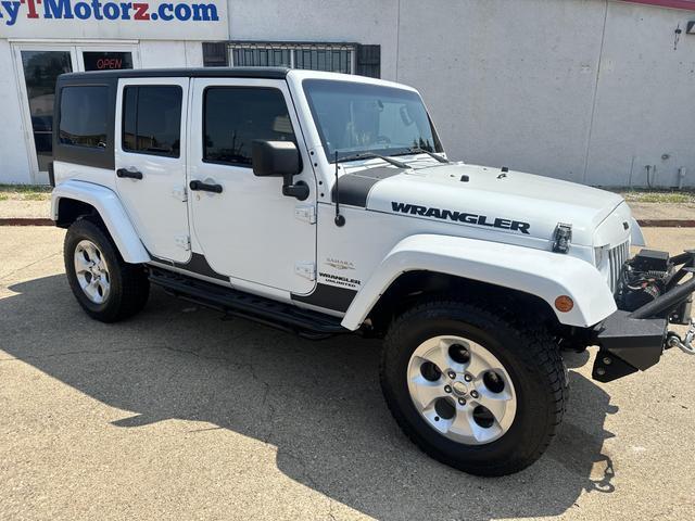 used 2013 Jeep Wrangler Unlimited car, priced at $15,495