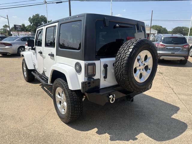 used 2013 Jeep Wrangler Unlimited car, priced at $15,495