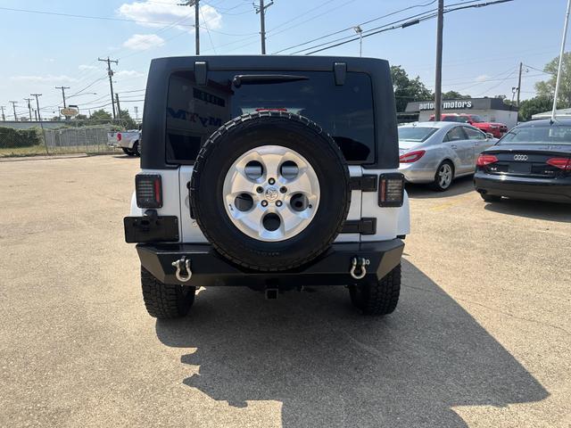 used 2013 Jeep Wrangler Unlimited car, priced at $15,495