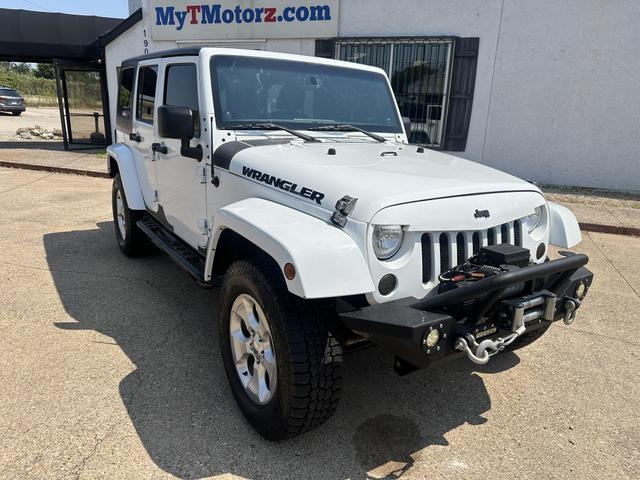 used 2013 Jeep Wrangler Unlimited car, priced at $15,495