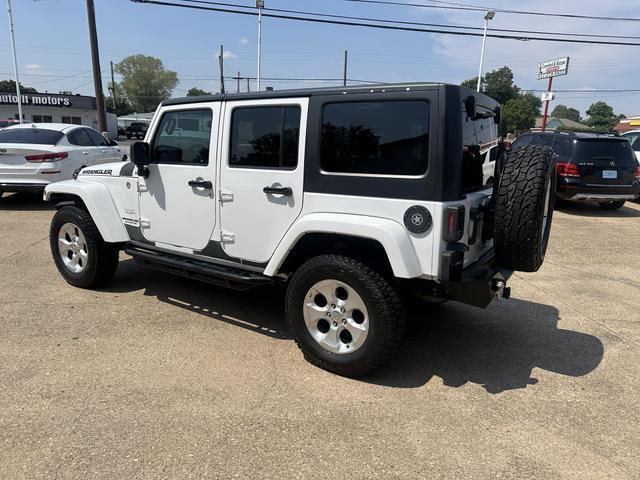 used 2013 Jeep Wrangler Unlimited car, priced at $15,495