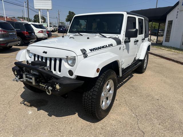 used 2013 Jeep Wrangler Unlimited car, priced at $15,495