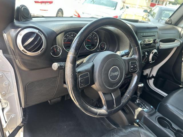 used 2013 Jeep Wrangler Unlimited car, priced at $15,495