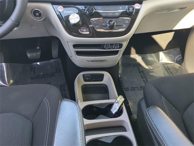 used 2023 Chrysler Voyager car, priced at $23,969