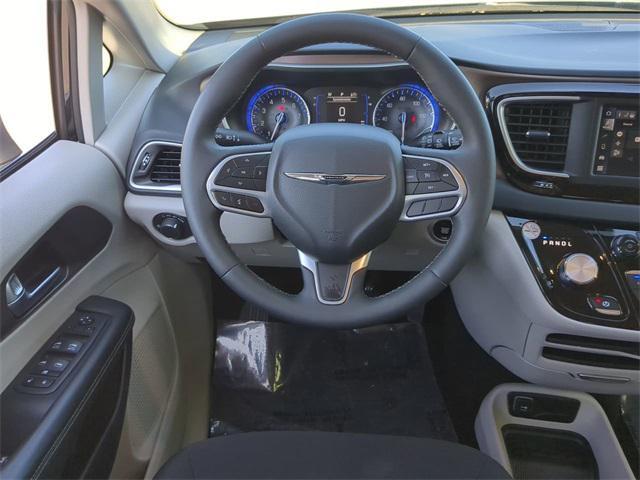 used 2023 Chrysler Voyager car, priced at $23,969