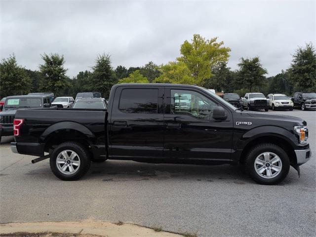 used 2018 Ford F-150 car, priced at $26,596