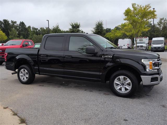 used 2018 Ford F-150 car, priced at $26,596