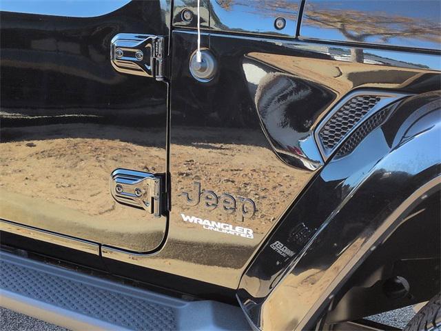 used 2021 Jeep Wrangler Unlimited car, priced at $35,569