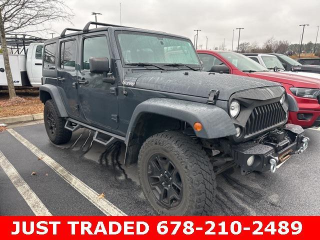 used 2016 Jeep Wrangler Unlimited car, priced at $20,453