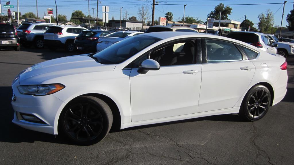 used 2018 Ford Fusion car, priced at $10,950