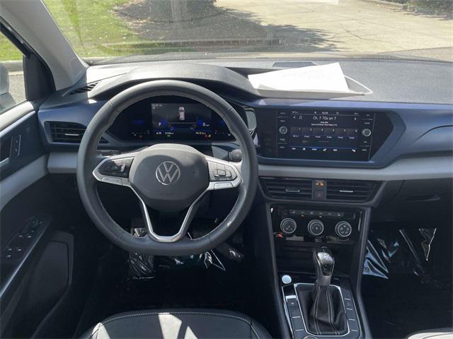 used 2023 Volkswagen Taos car, priced at $17,995