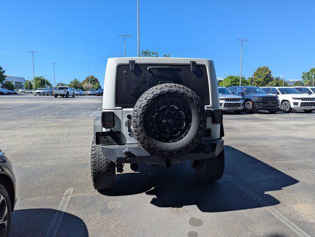used 2016 Jeep Wrangler Unlimited car, priced at $22,477