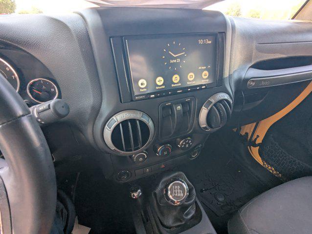 used 2015 Jeep Wrangler car, priced at $14,644