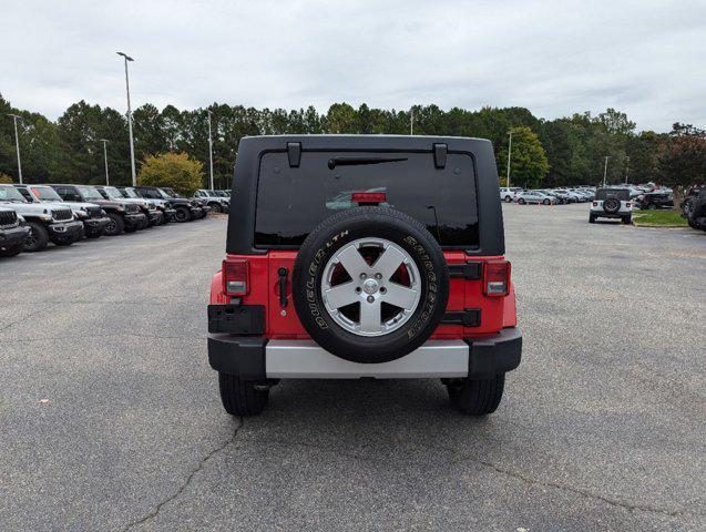 used 2012 Jeep Wrangler Unlimited car, priced at $13,977