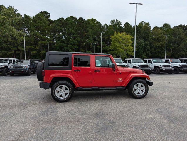 used 2012 Jeep Wrangler Unlimited car, priced at $13,977