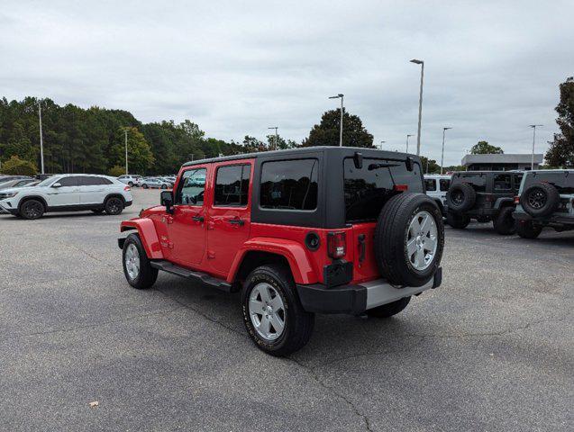 used 2012 Jeep Wrangler Unlimited car, priced at $13,977