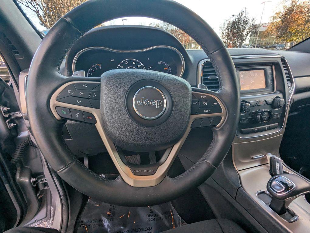 used 2014 Jeep Grand Cherokee car, priced at $11,577