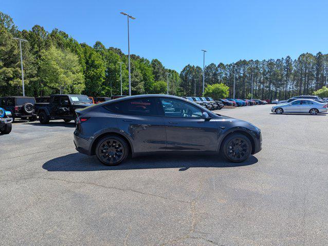 used 2025 Tesla Model Y car, priced at $39,977