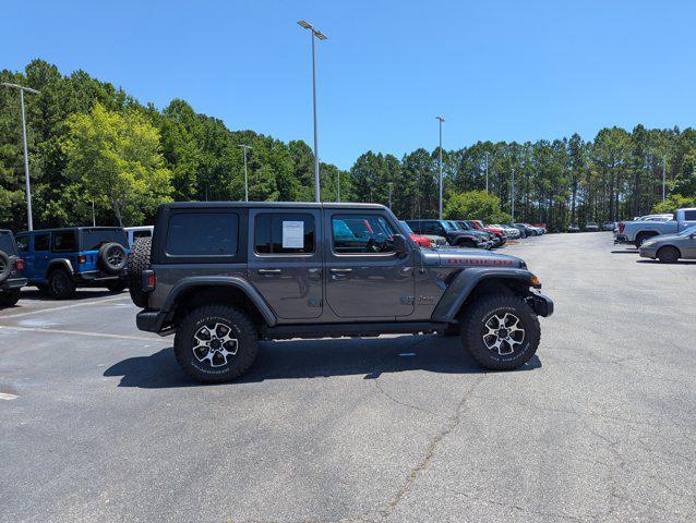 used 2023 Jeep Wrangler car, priced at $42,798