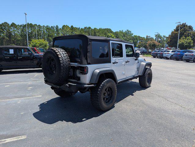 used 2012 Jeep Wrangler Unlimited car, priced at $22,577