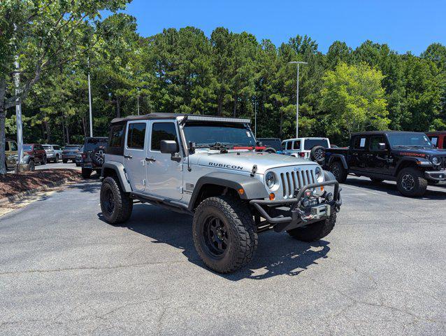 used 2012 Jeep Wrangler Unlimited car, priced at $22,577