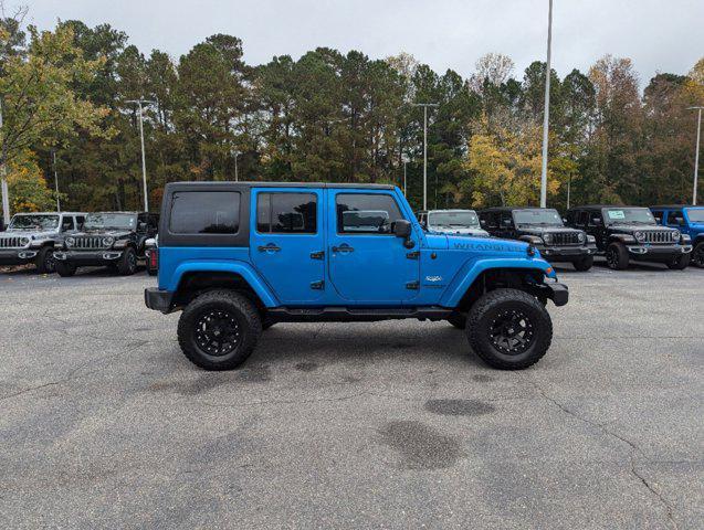 used 2015 Jeep Wrangler Unlimited car, priced at $16,977