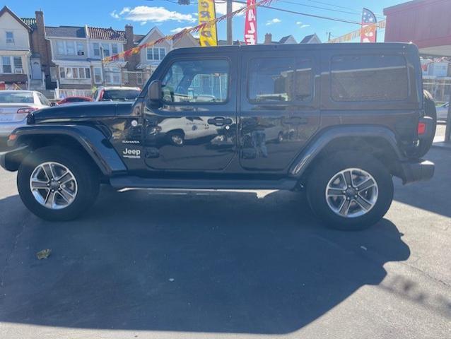 used 2020 Jeep Wrangler Unlimited car, priced at $32,490