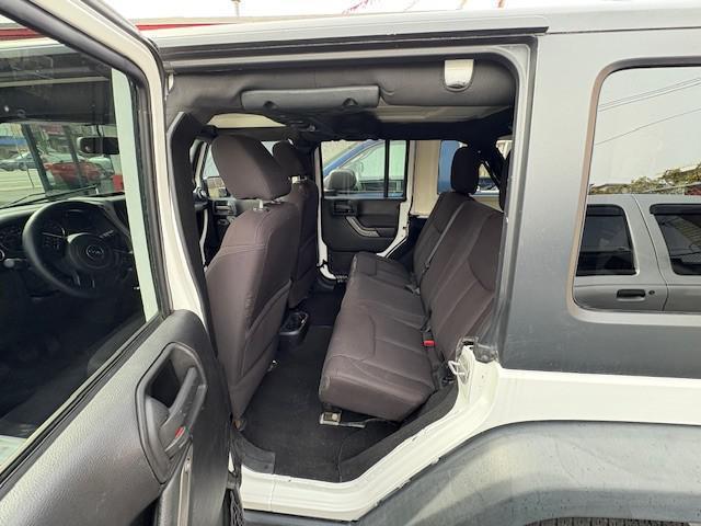 used 2013 Jeep Wrangler Unlimited car, priced at $9,990