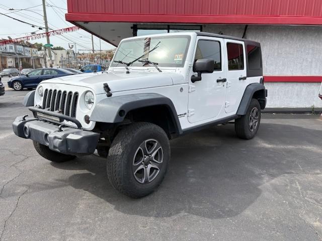 used 2013 Jeep Wrangler Unlimited car, priced at $9,990