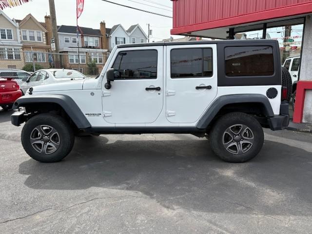 used 2013 Jeep Wrangler Unlimited car, priced at $9,990
