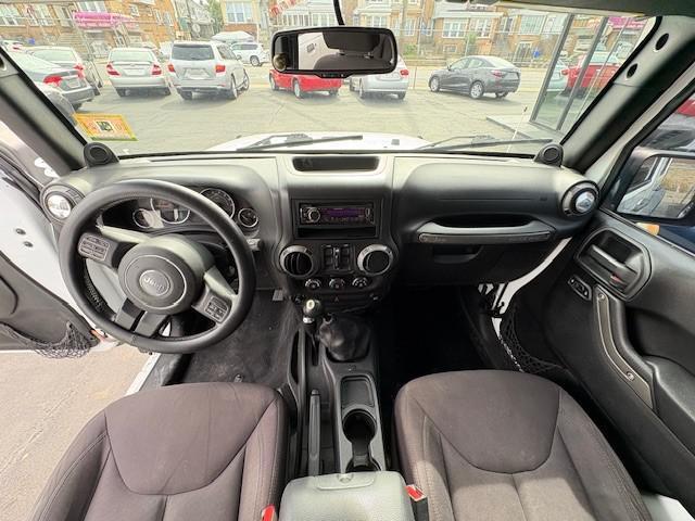 used 2013 Jeep Wrangler Unlimited car, priced at $9,990