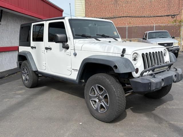 used 2013 Jeep Wrangler Unlimited car, priced at $9,990