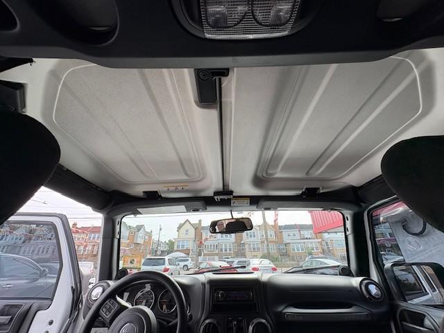 used 2013 Jeep Wrangler Unlimited car, priced at $9,990
