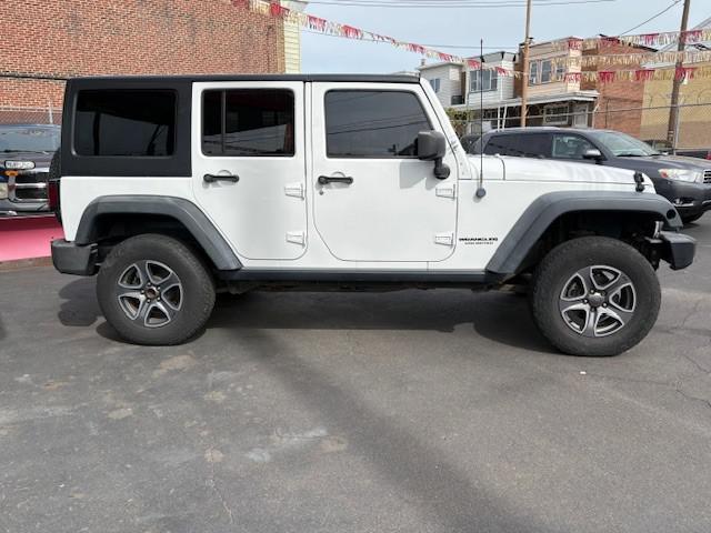 used 2013 Jeep Wrangler Unlimited car, priced at $9,990