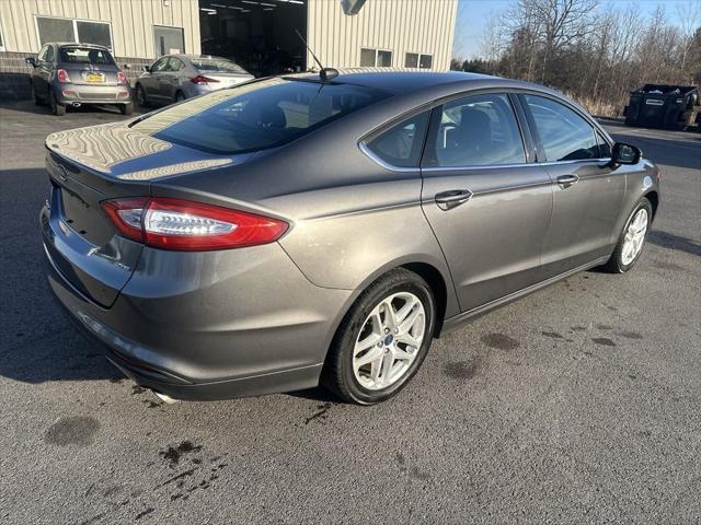 used 2014 Ford Fusion car, priced at $10,627