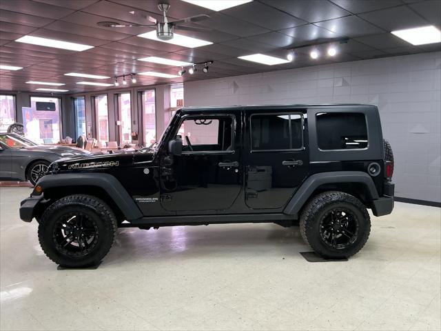 used 2010 Jeep Wrangler Unlimited car, priced at $11,995