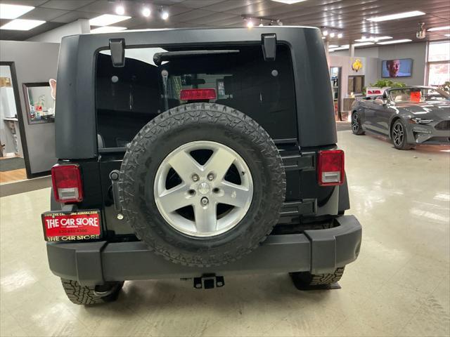 used 2010 Jeep Wrangler Unlimited car, priced at $11,995