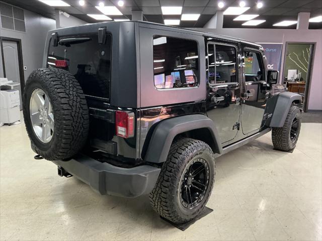 used 2010 Jeep Wrangler Unlimited car, priced at $11,995