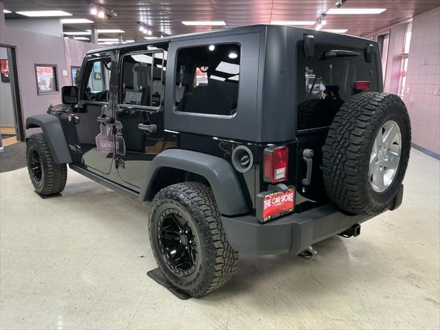 used 2010 Jeep Wrangler Unlimited car, priced at $11,995