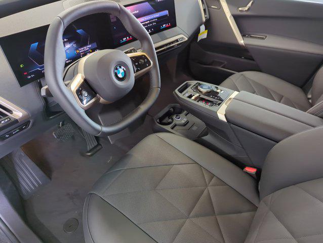new 2026 BMW iX car, priced at $94,795
