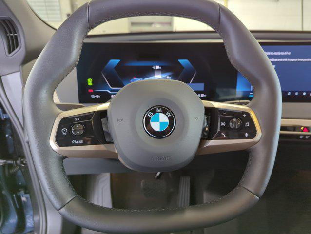 new 2026 BMW iX car, priced at $94,795