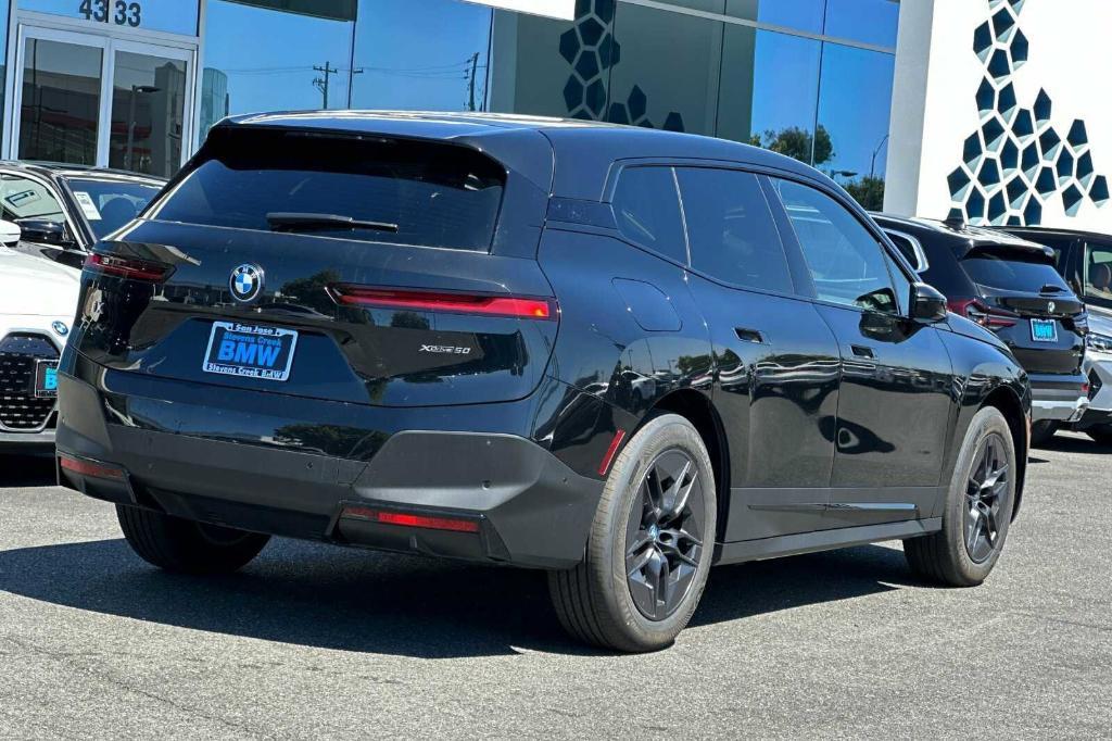 new 2025 BMW iX car, priced at $90,455