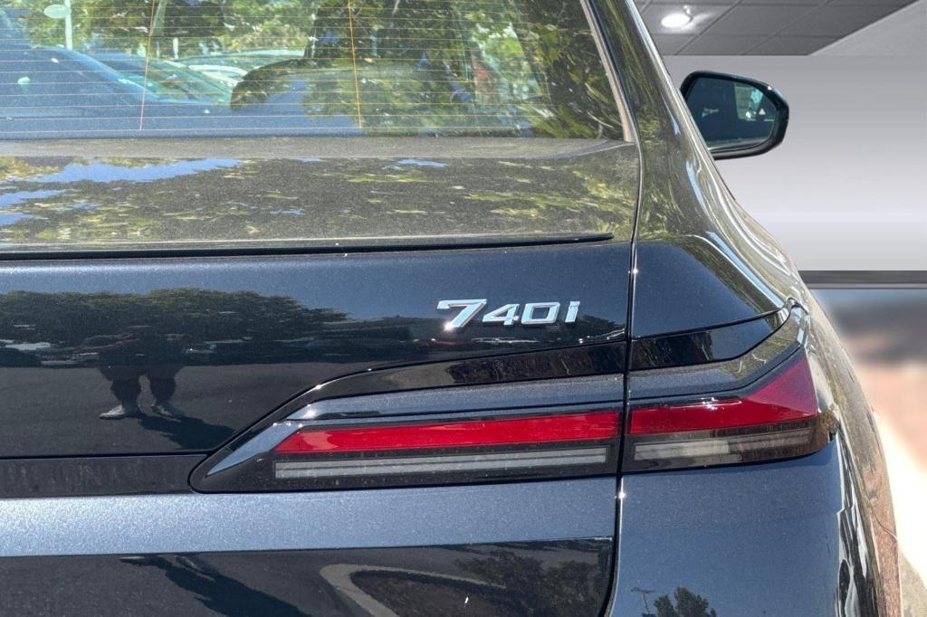 new 2025 BMW 740 car, priced at $107,855